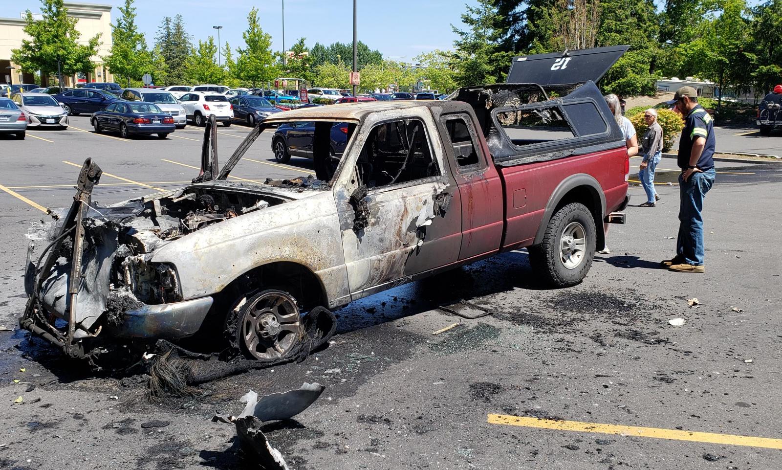 PHOTOS: Pickup truck destroyed behind Fred Meyer